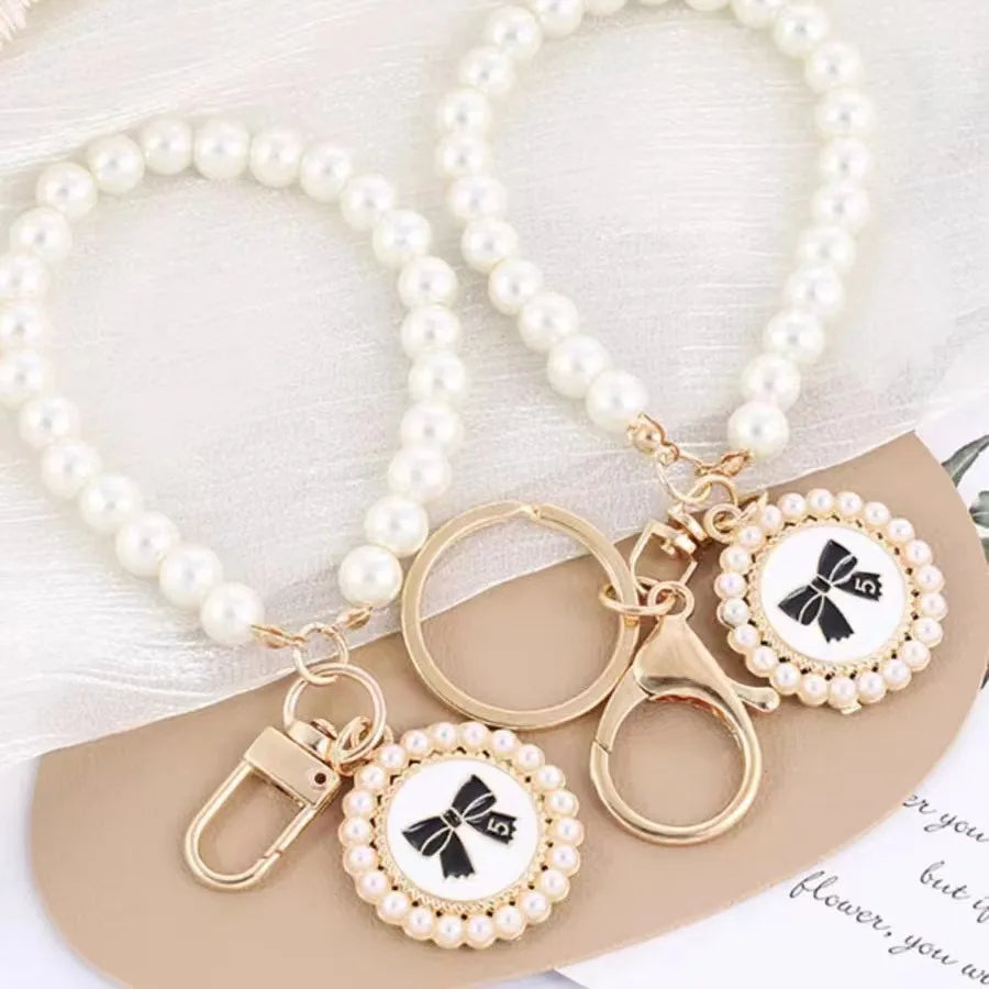 ZAKOL Cute Pearl Keychain for Women Girls Shiny Pearl Bead Shell Phone Bag Backpack Charm Accessory Car Key Key Chain Pendant